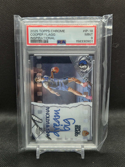2025 Topps Chrome basketball rookie card of Cooper Flagg in blue Dallas Mavericks uniform with "dream big" inspirational design and autograph