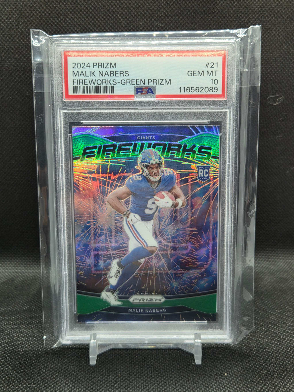 2024 Panini Prizm football card of Malik Nabers in New York Giants uniform with green prizm reflective fireworks design and RC rookie shield