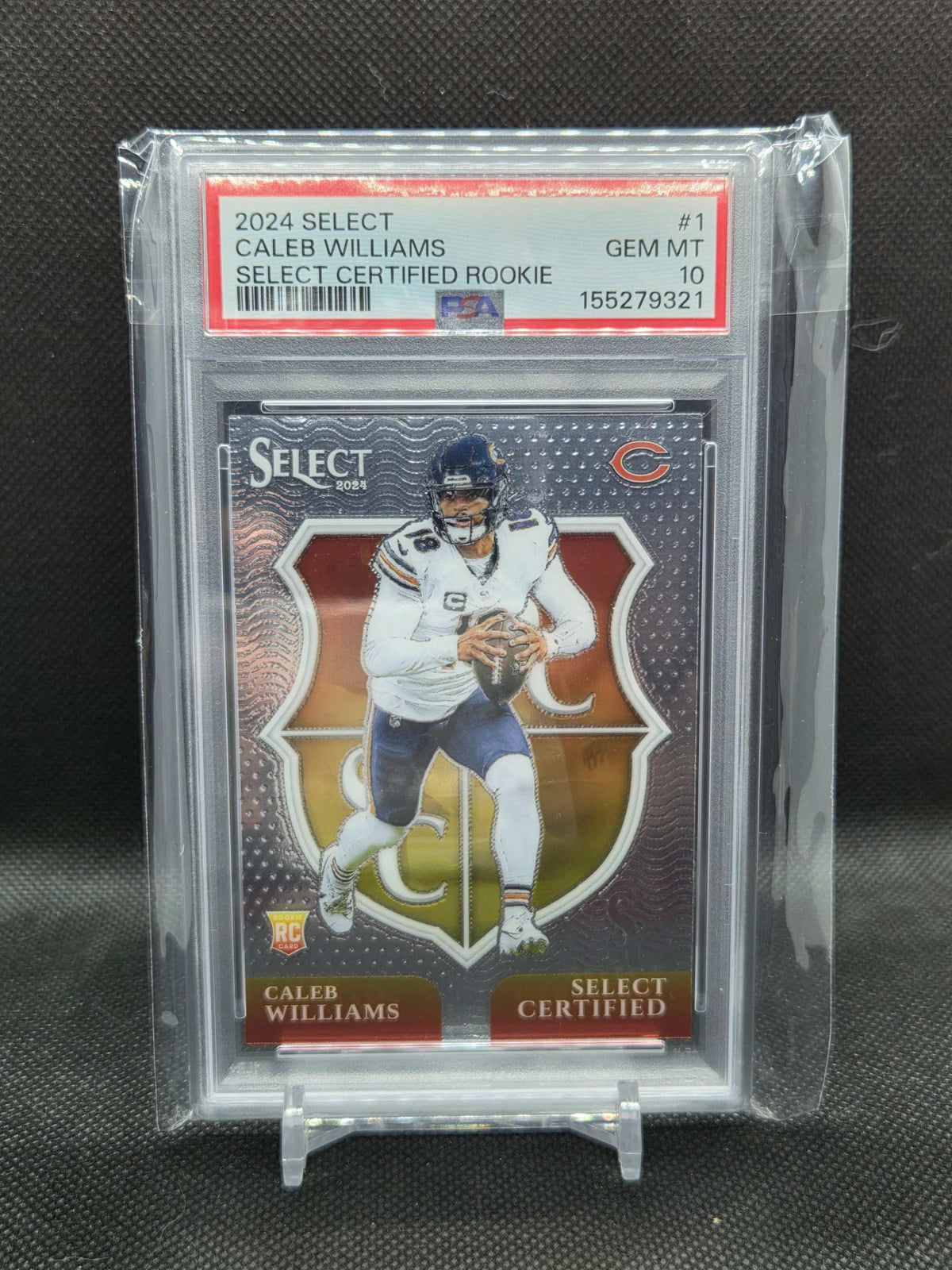 2024 Panini Select Caleb Williams Select Certified rookie card in a PSA 10 GEM MINT slab, shield design and Bears colors