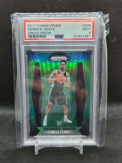2017-18 Panini Prizm Derrick White rookie basketball card, green reflective Prizm finish in a PSA 9 holder.
