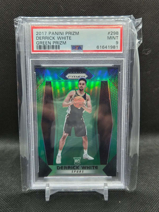 2017-18 Panini Prizm Derrick White rookie basketball card, green reflective Prizm finish in a PSA 9 holder.