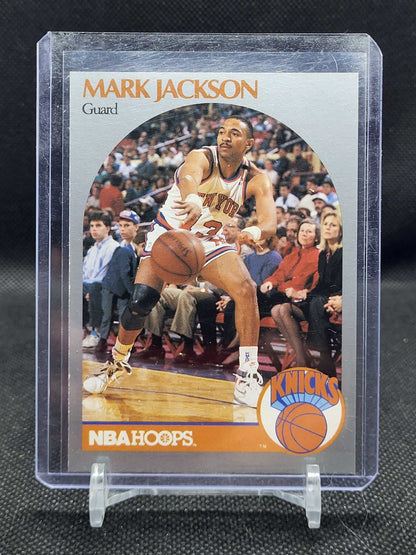 1990 NBA Hoops Mark Jackson card with Menendez Brothers in background.