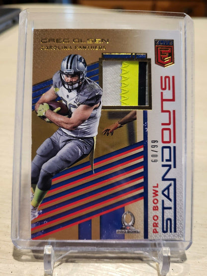 2017 Panini Donruss Elite Greg Olsen Pro Bowl Standouts Jersey Card 60/99 showcasing exclusive jersey piece.