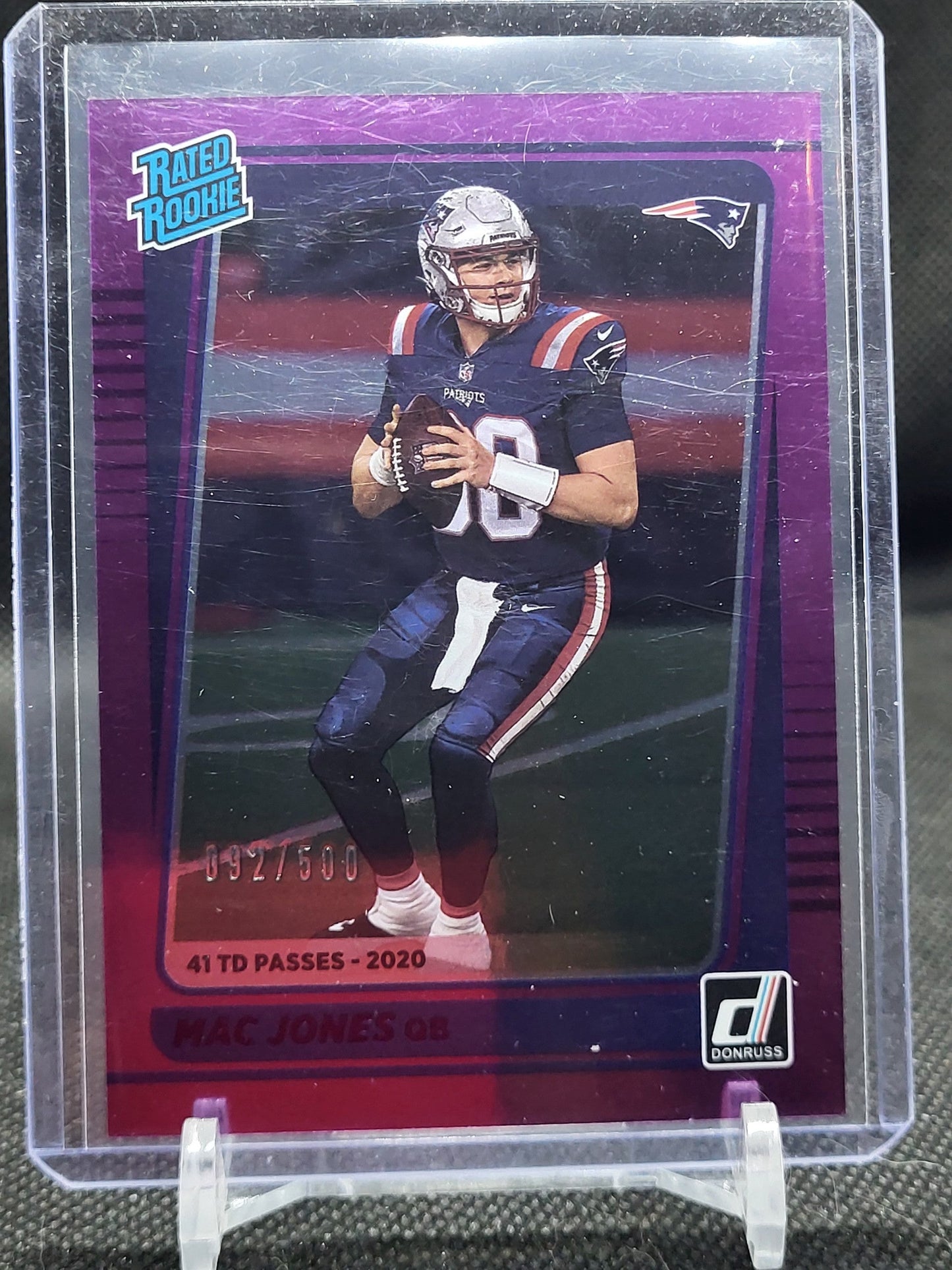 2021 Panini Donruss Season Stat Line Mac Jones Rookie Card in protective case.