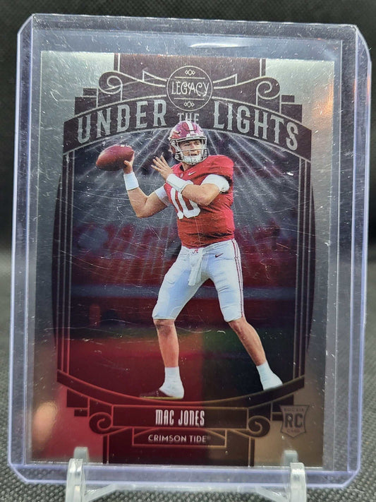 2021 Panini Legacy Mac Jones Under The Lights Rookie RC sports card.