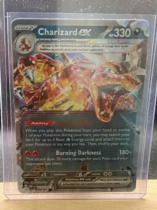 CHARIZARD ex 125/197 Obsidian Flames Pokémon card in mint condition with fiery design.