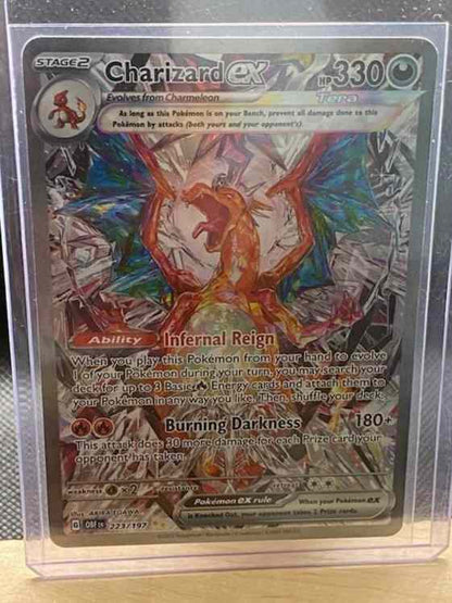 Obsidian Flames #223/197 Charizard ex card with stunning art in protective case.