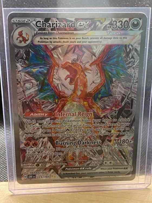 Obsidian Flames #223/197 Charizard ex card with stunning art in protective case.