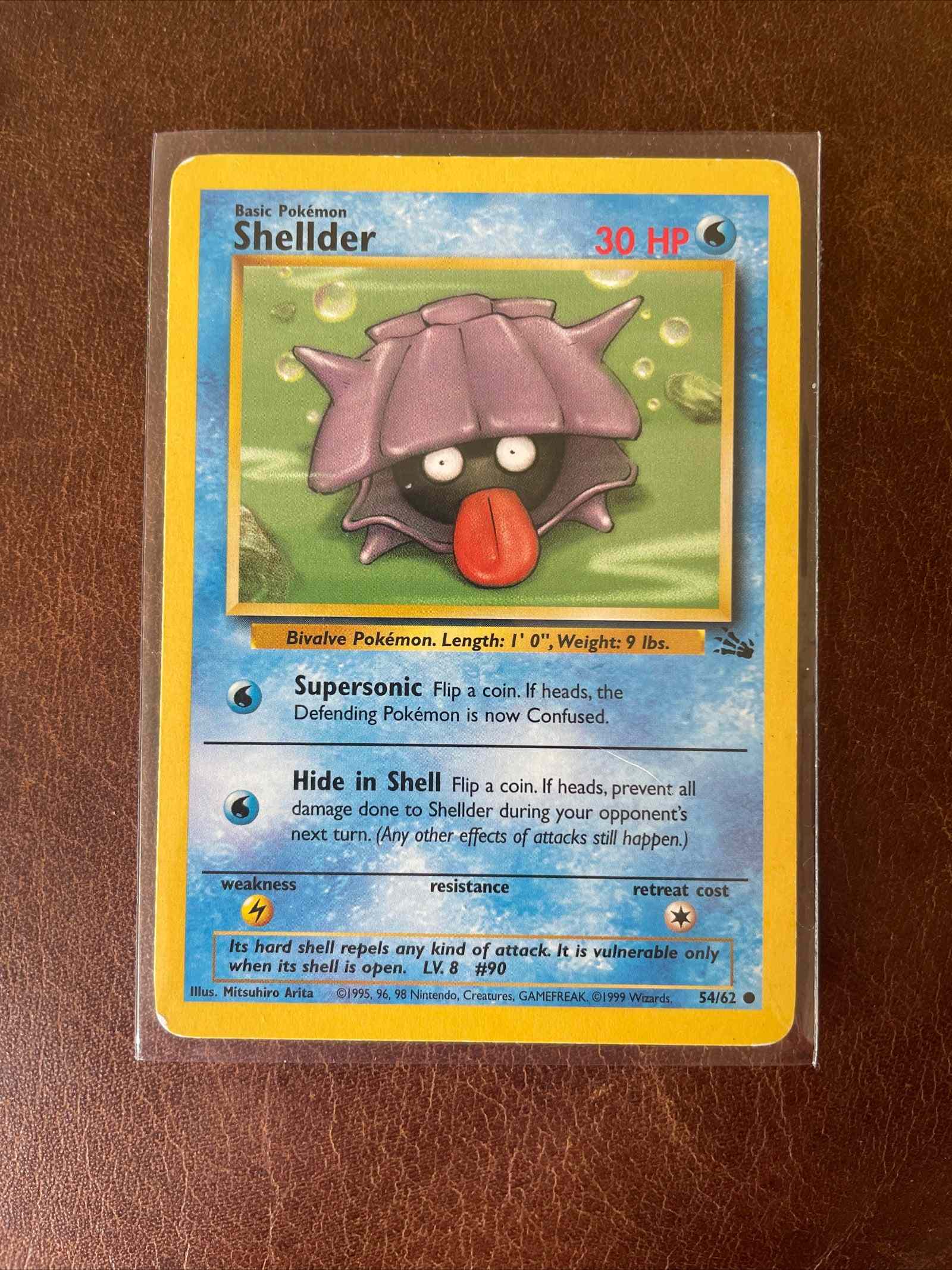 1995 Pokemon non-holo lot with 11 unique cards, featuring Shellder card.