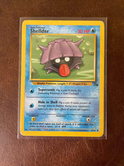 1995 Pokemon non-holo lot with 11 unique cards, featuring Shellder card.