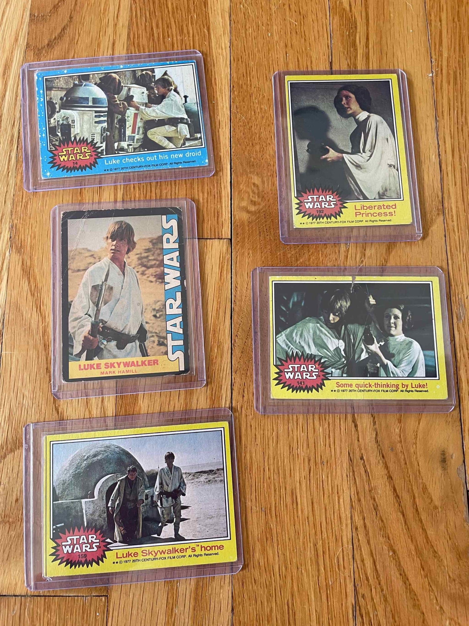 Rare 1977 Star Wars card lot featuring 5 iconic cards.
