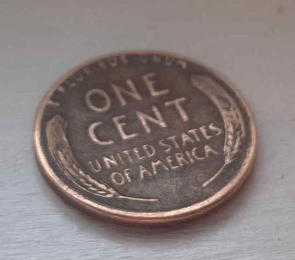 Beautiful 1955 wheat penny, Lincoln silhouette, Rarity Rack auction, coin collectible.