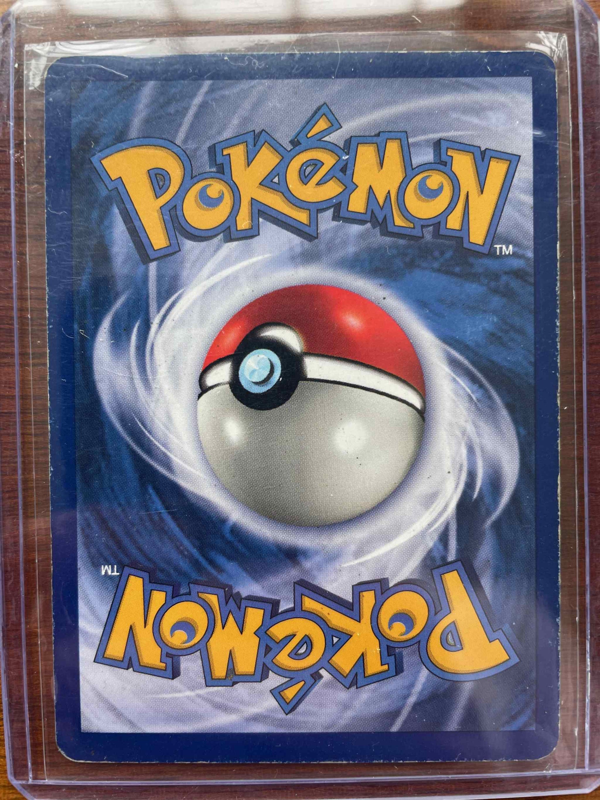 Fossil #11/62 Magneton Pokémon trading card with electric and steel abilities.