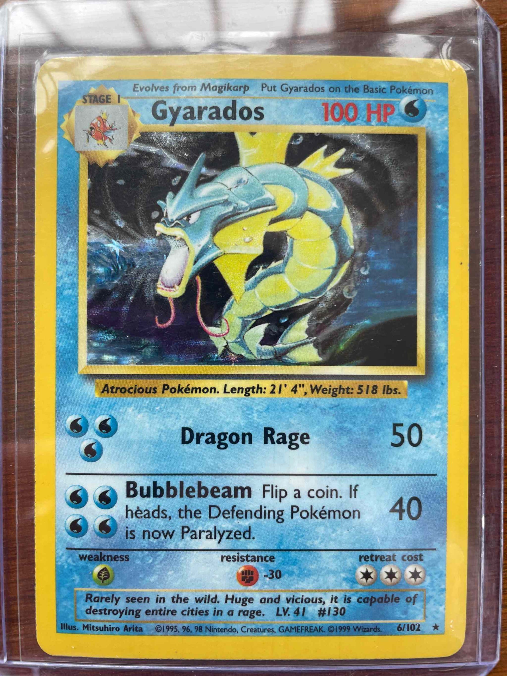 Base Set 006/102 Gyarados Pokémon card, original design, valuable collectible.
