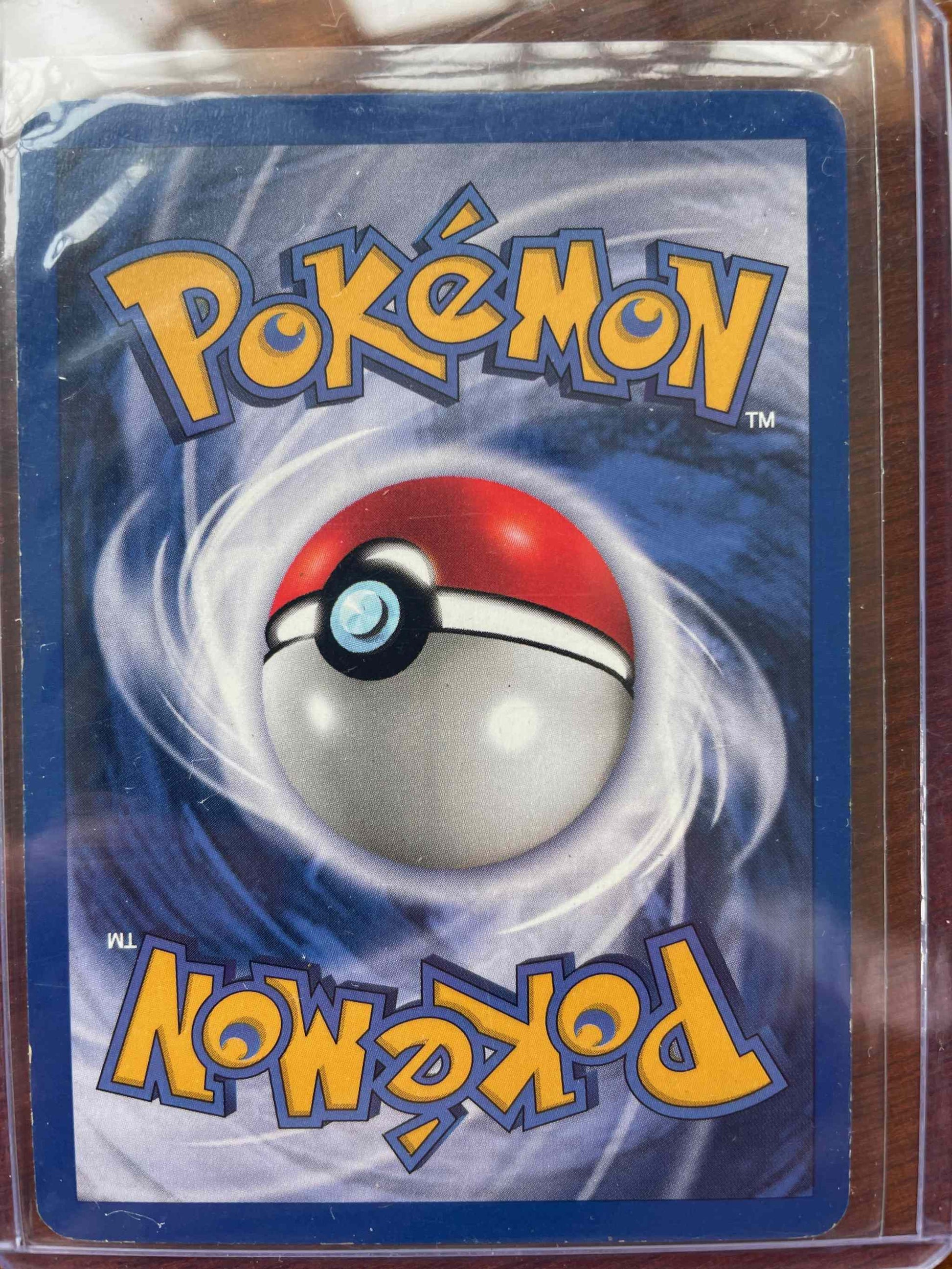 Team Rocket #2/82 Dark Arbok rare Pokémon card.