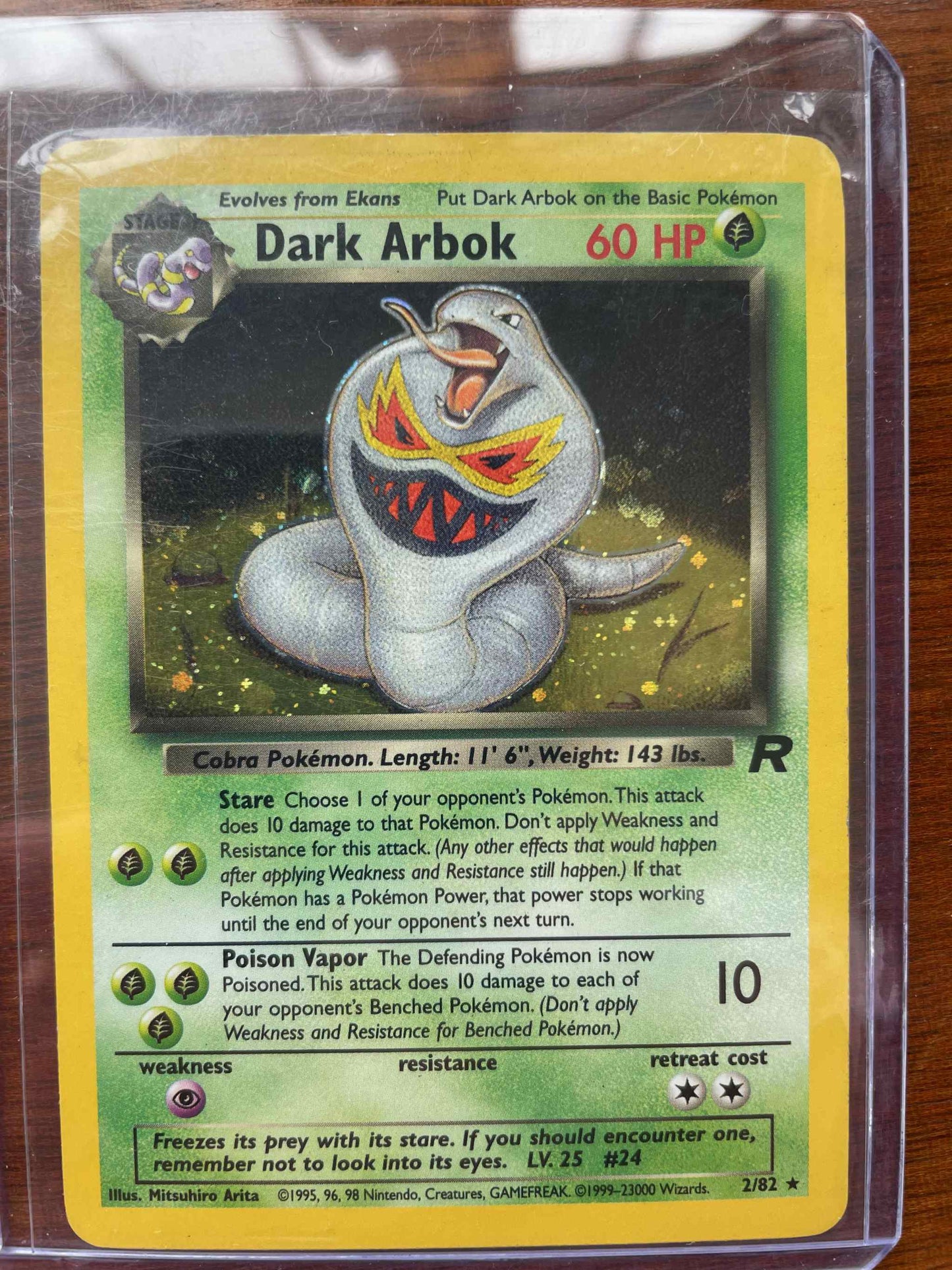 Team Rocket Dark Arbok #2/82 Pokémon card, showcasing unique design and abilities.