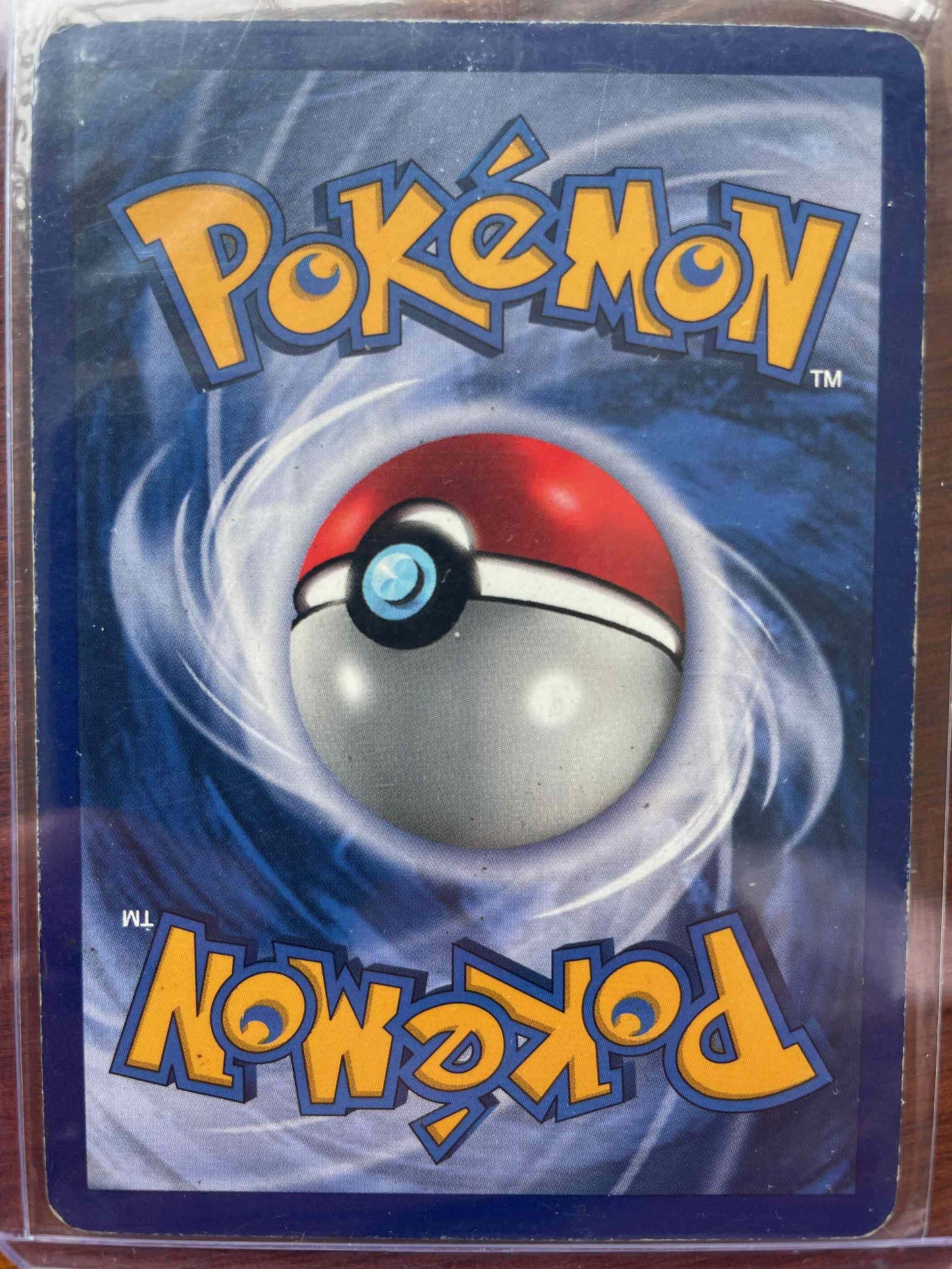 Jungle #01/64 Clefable Pokemon card in protective sleeve.