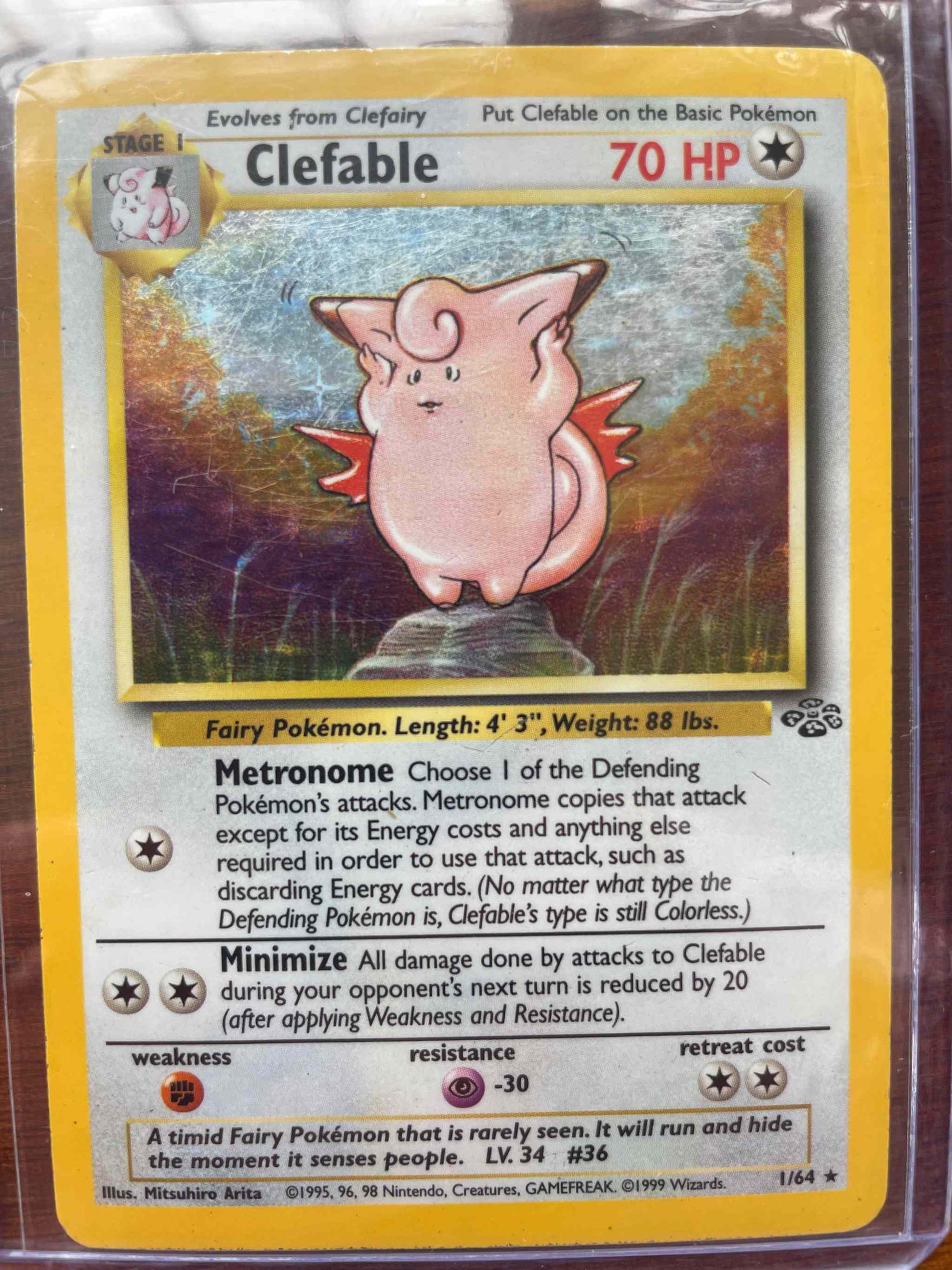 Jungle #01/64 Clefable Pokemon card with rare and beautiful design.