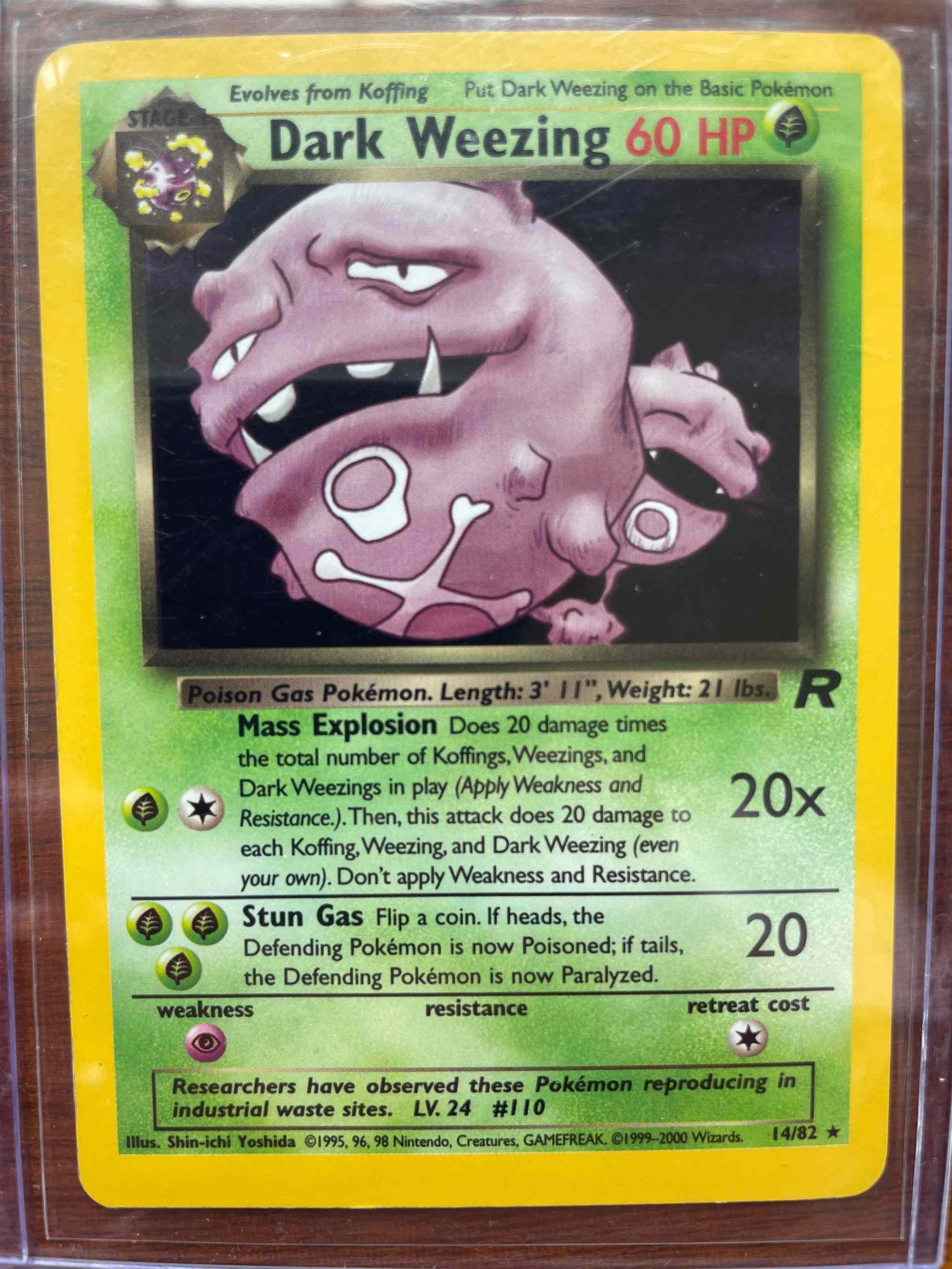 Team Rocket Dark Weezing card #14/82, rare collectible Pokémon card.