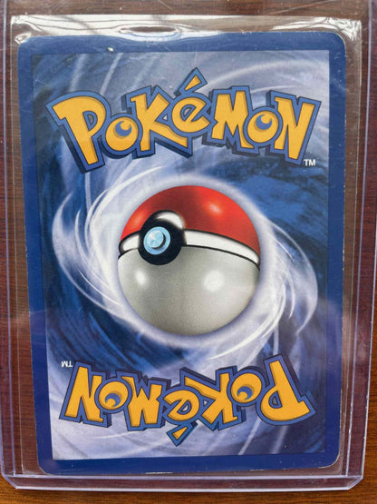 Pokémon Base Set #006/130 Clefairy trading card in protective sleeve.