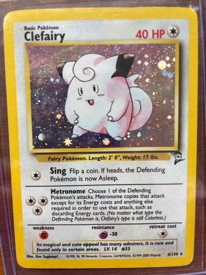 Base Set #006/130 Clefairy trading card with pink color and whimsical moves.