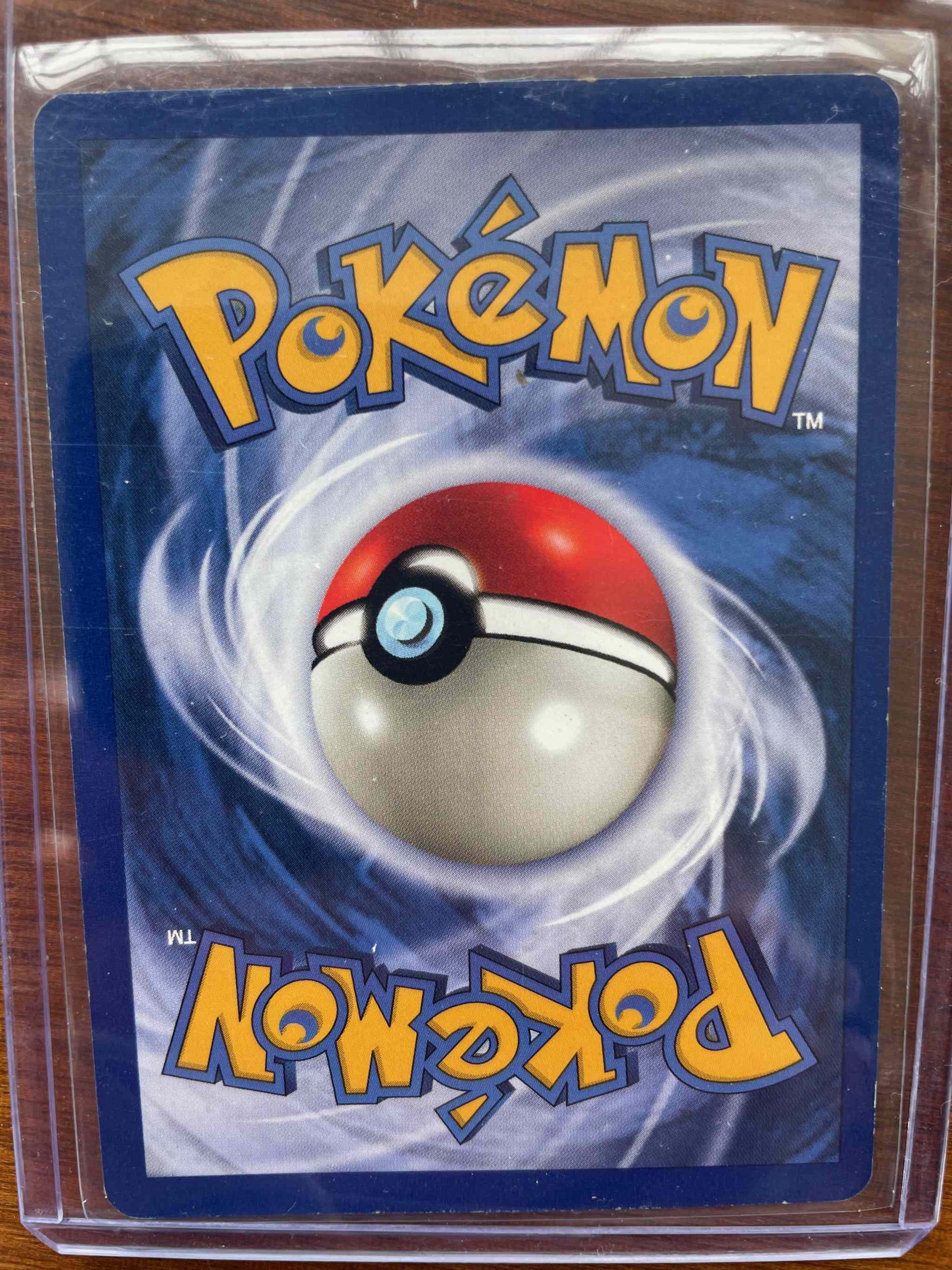 Pokemon card featuring Fossil #06/62 Haunter with a Pokeball design on the back.