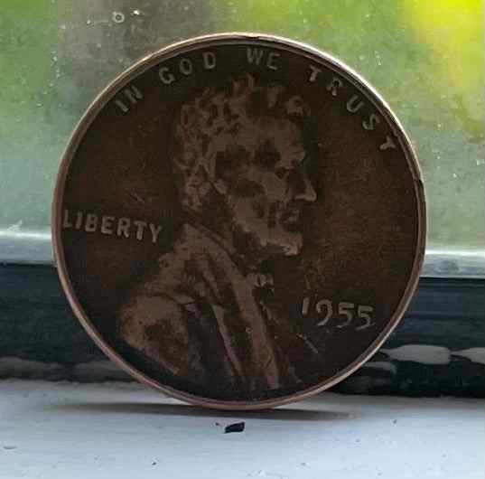 Beautiful 1955 wheat penny with Lincoln's silhouette, first auctioned on Rarity Rack.