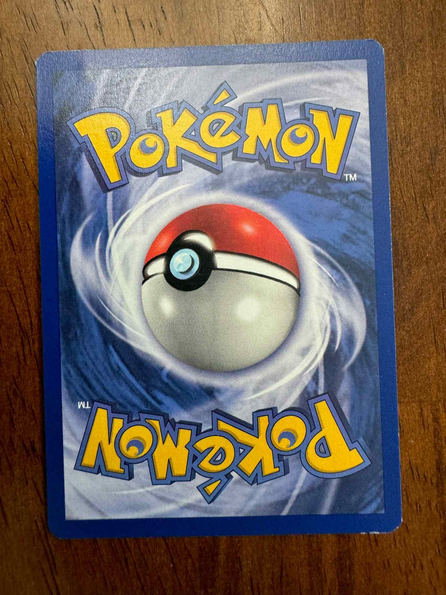 Base Set #023/102 Arcanine collectible Pokémon card with iconic artwork.