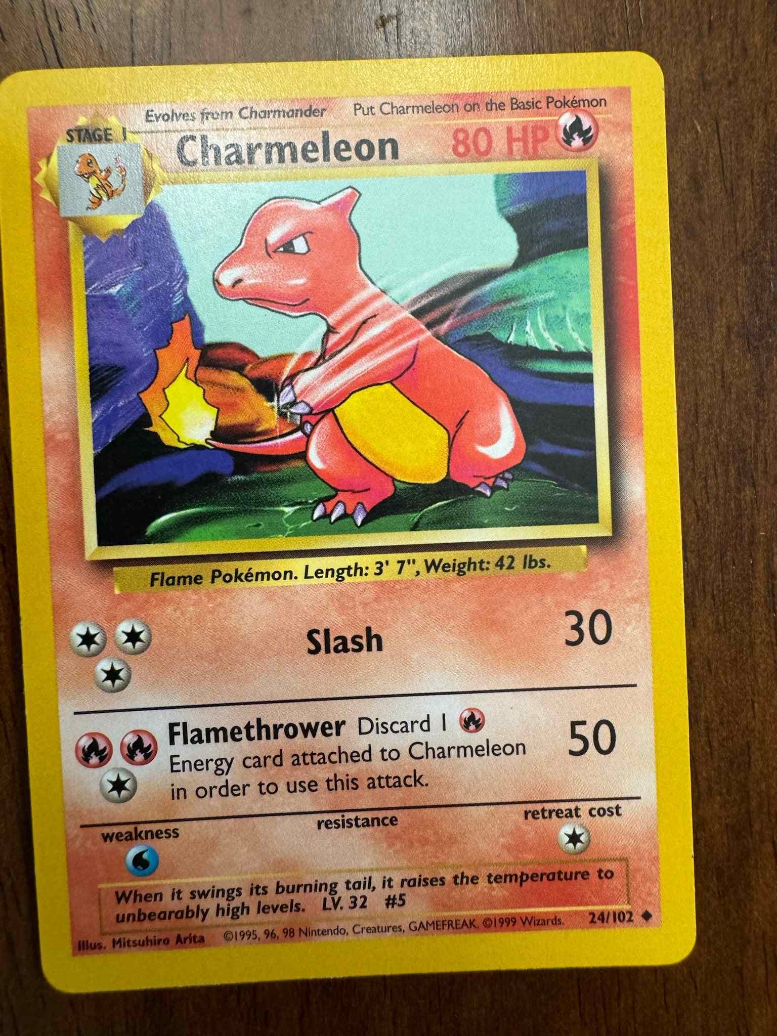 Base Set #024/102 Charmeleon Pokémon card with striking artwork and abilities.