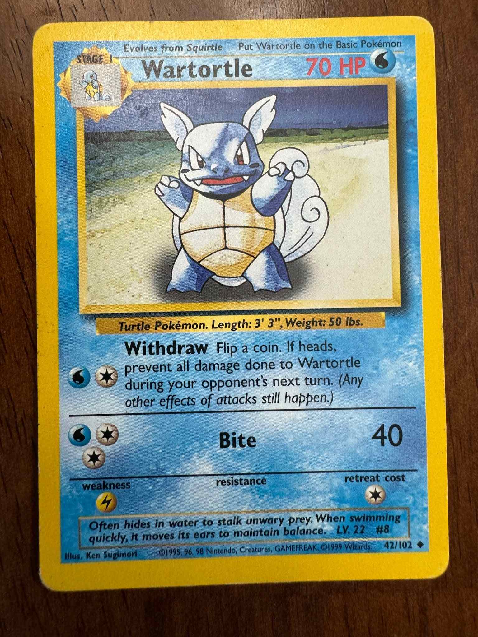 Wartortle Base Set #042/102 collectible card showcasing rarity and quality.