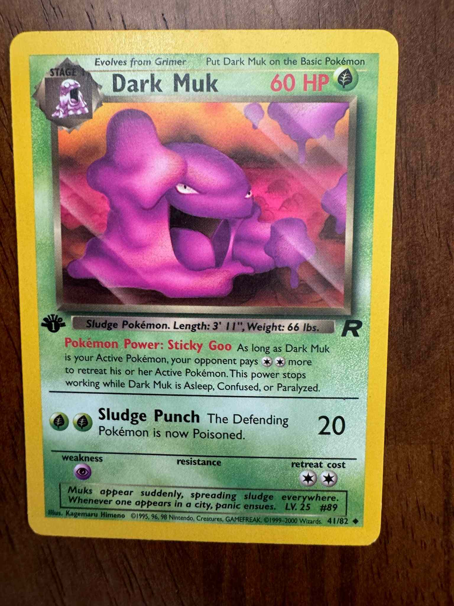 Team Rocket #41/82 Dark Muk trading card with powerful attacks.