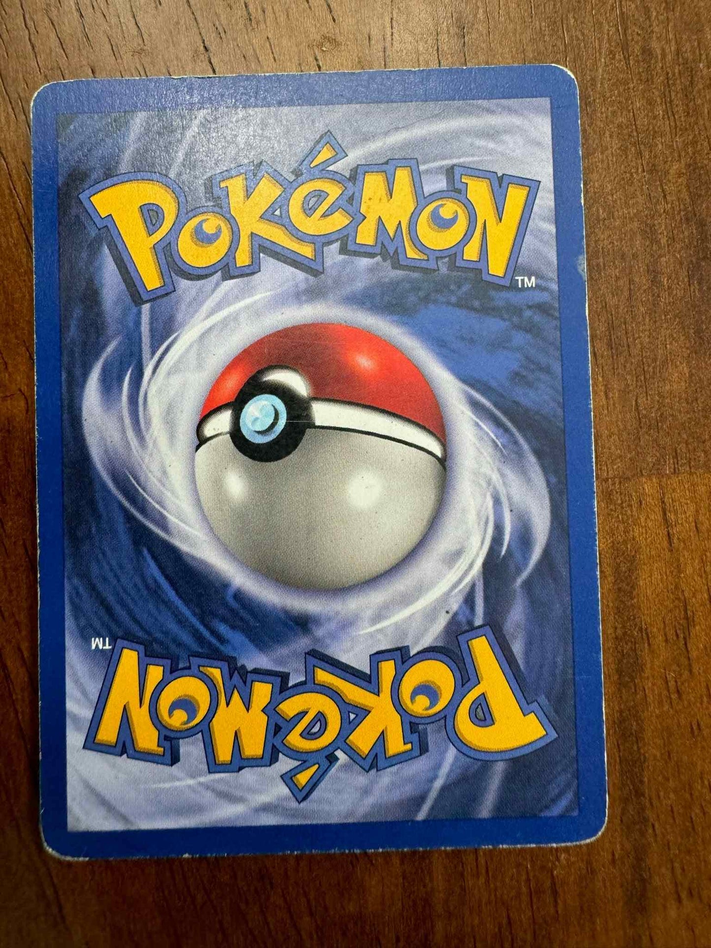 Base Set #021/102 Electrode Pokémon card, valuable collector's item.