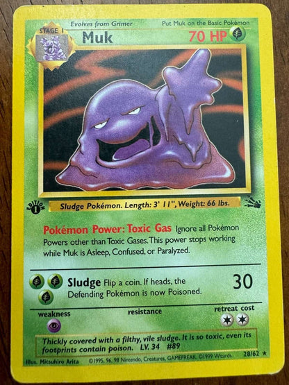 Fossil #28/62 Muk Pokemon card, rare collector's item.