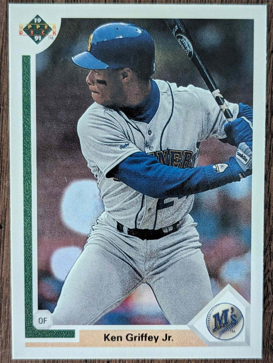 1999 Upper Deck #555 Ken Griffey Jr. baseball card in pristine condition.