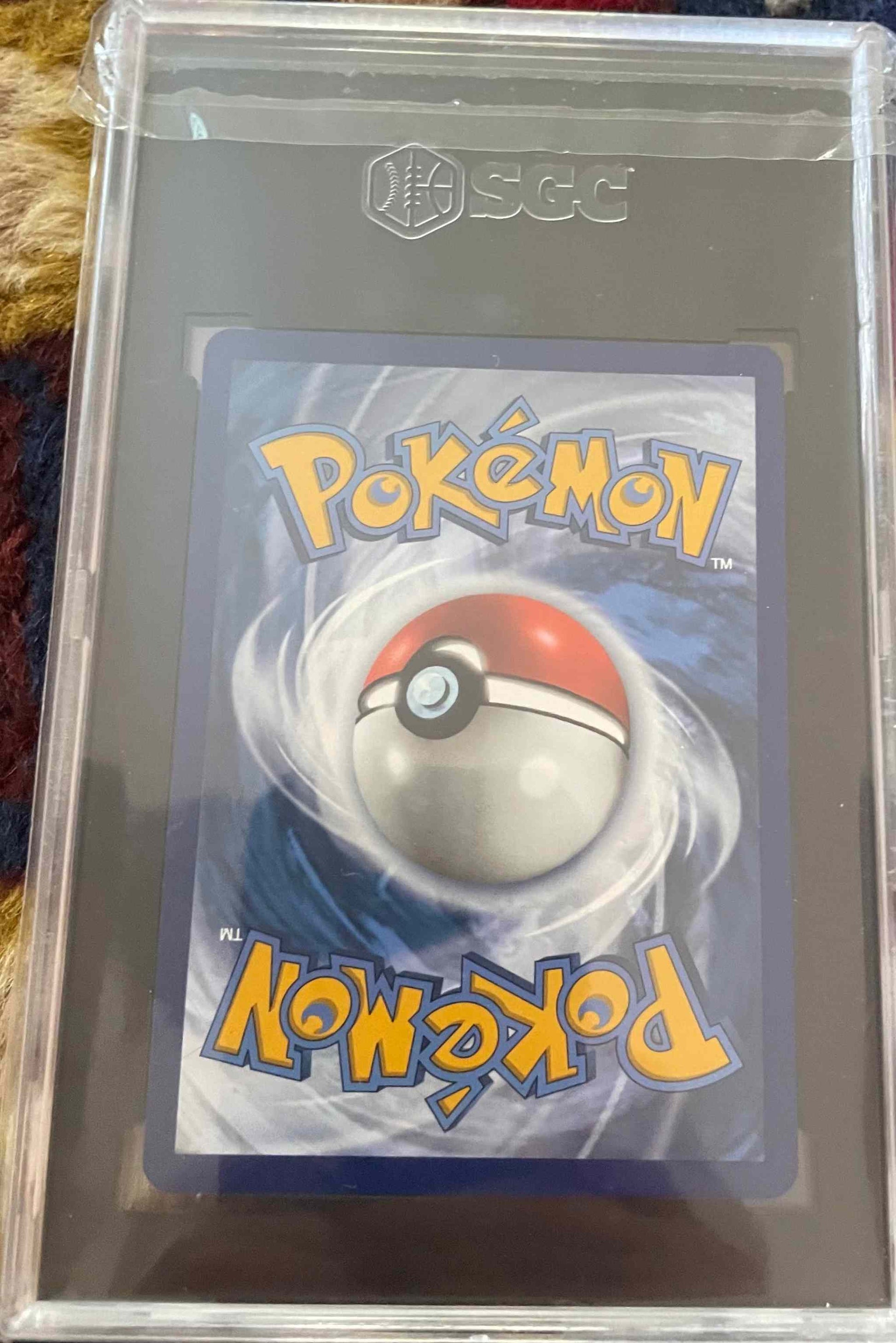 Evolving Skies #189/203 Umbreon V Alternate Art SGC 9.5 card in protective case.