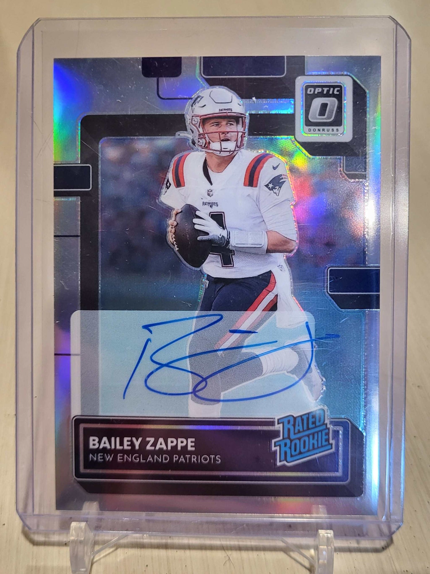 Bailey Zappe 2022 Panini Donruss Optic Rated Rookie Prizm auto card #099/125 in protective case.