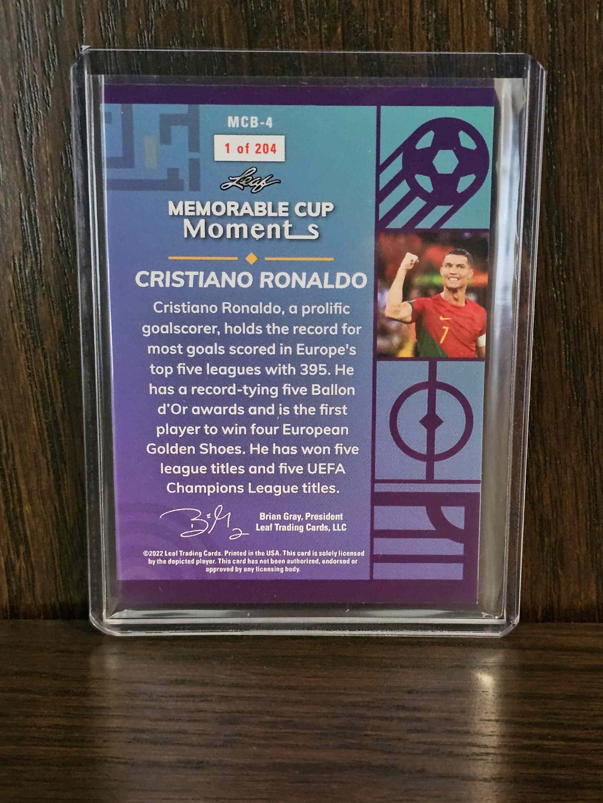 2022 Leaf Memorable Moments Cristiano Ronaldo card featuring iconic soccer highlights.