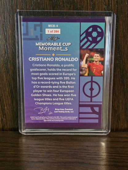 2022 Leaf Memorable Moments Cristiano Ronaldo card featuring iconic soccer highlights.