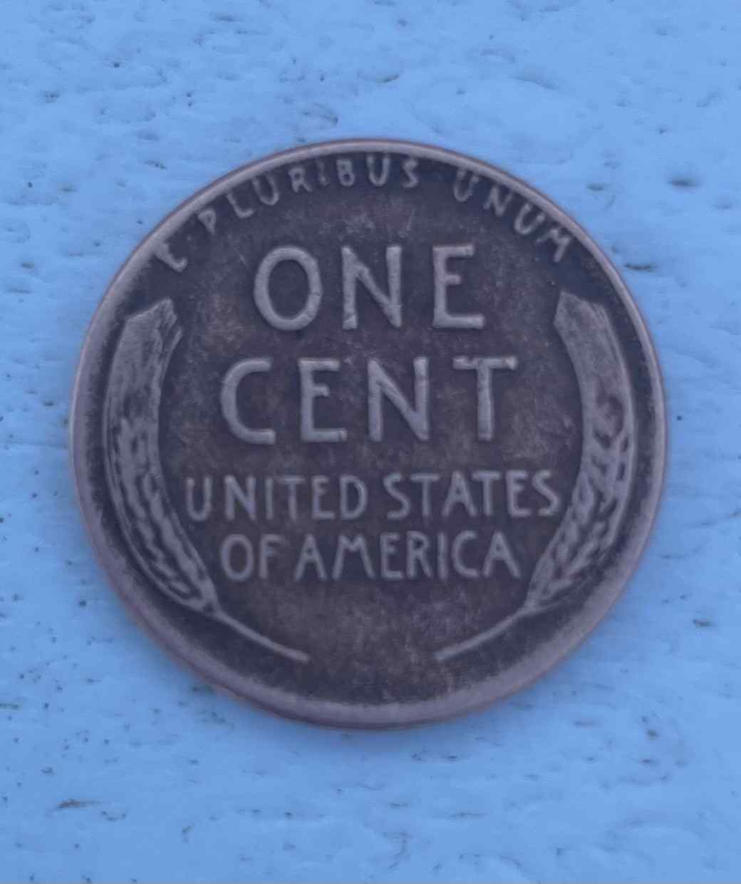 Beautiful 1955 wheat penny up for auction, featuring iconic design.