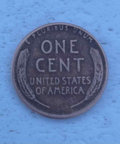 Beautiful 1955 wheat penny up for auction, featuring iconic design.