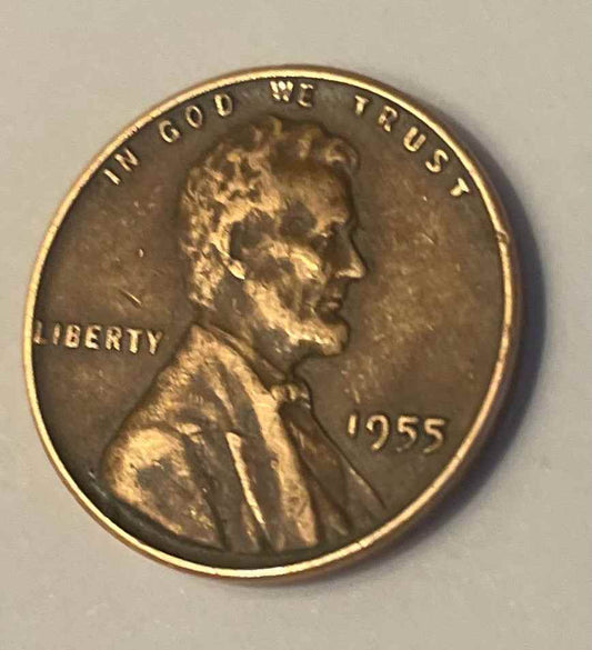 beautiful 1955 wheat penny with Lincoln's silhouette, auctioned on Rarity Rack