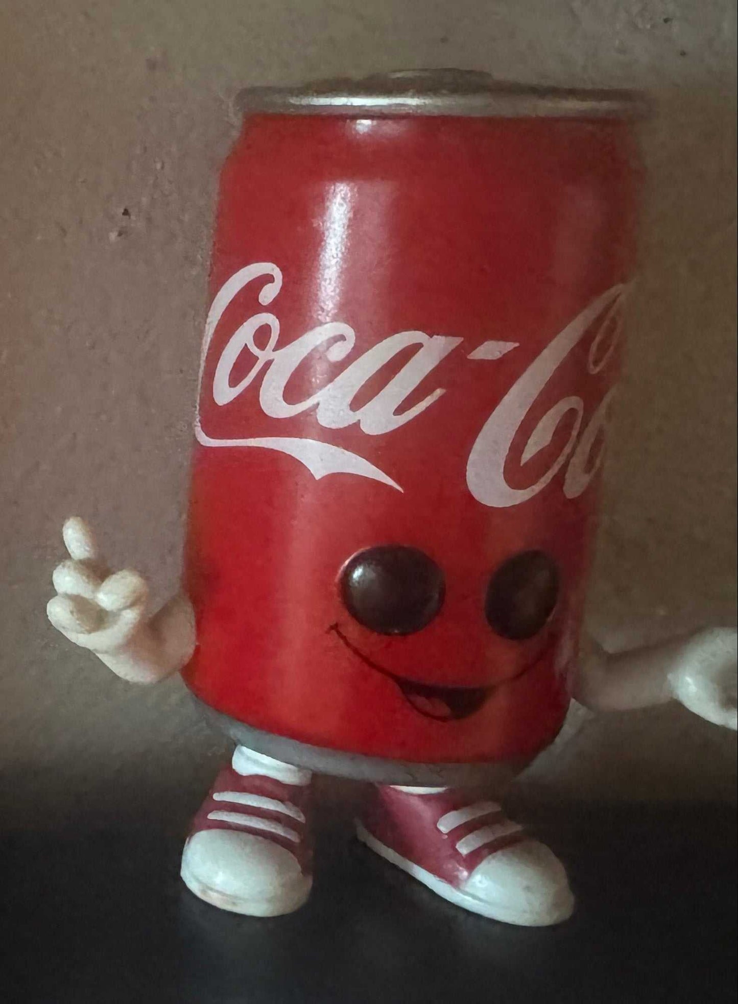 Funko Pop! Coca-Cola vinyl figure of a smiling red Coca-Cola can with arms and sneakers
