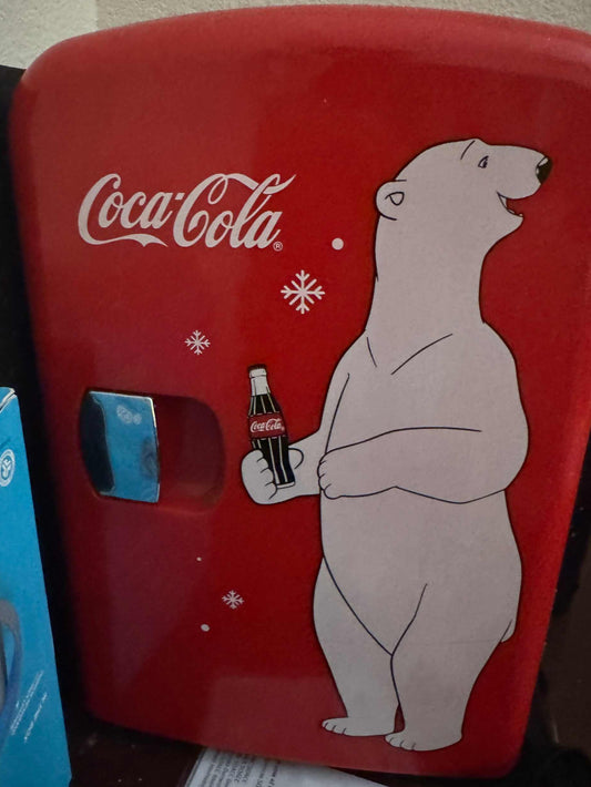 Red Coca-Cola Polar Bear mini fridge with retro design and thermoelectric cooling