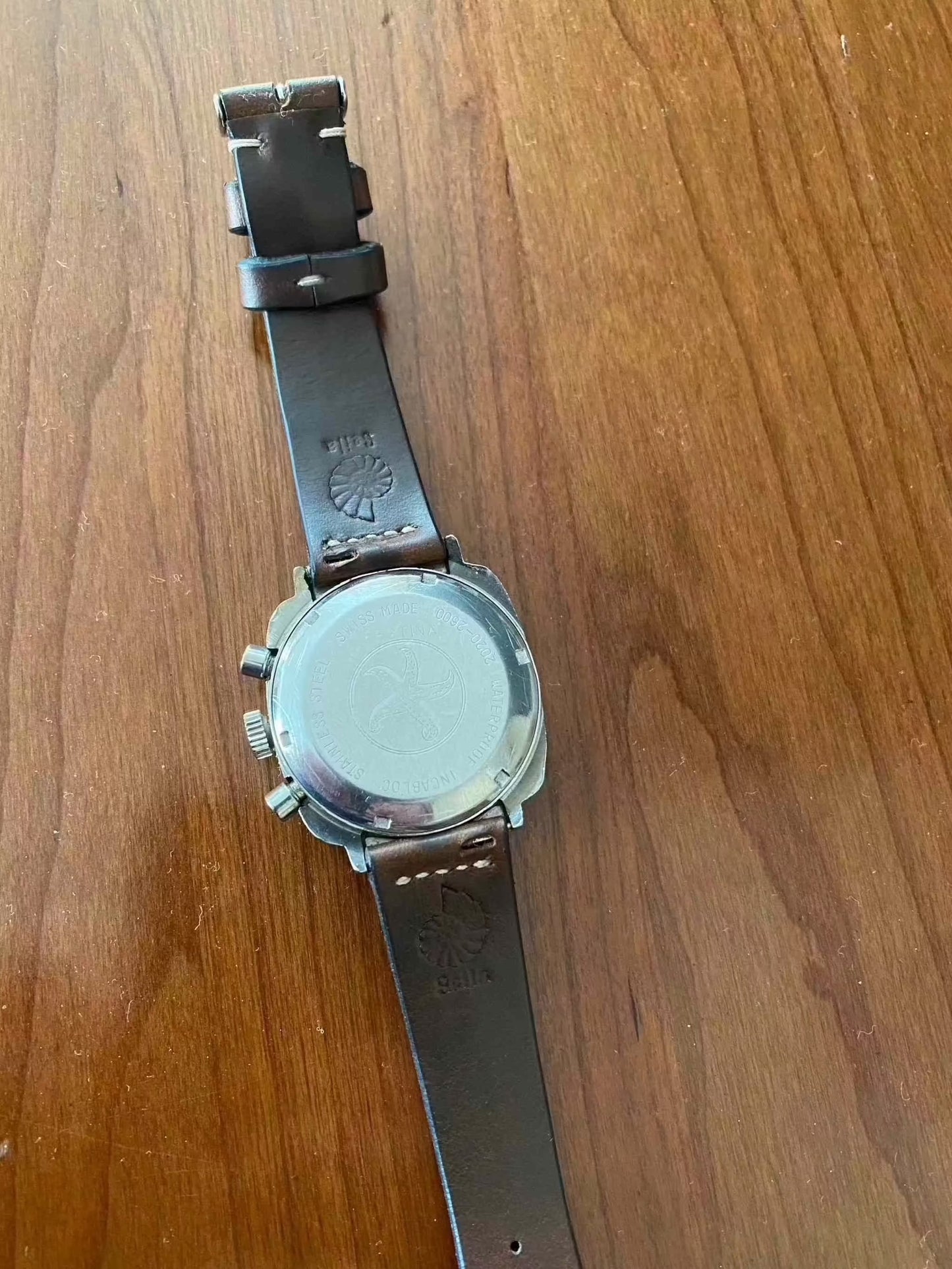 Vintage Festina Incabloc Chronograph Valjoux 7733 watch with leather strap and stainless steel case.