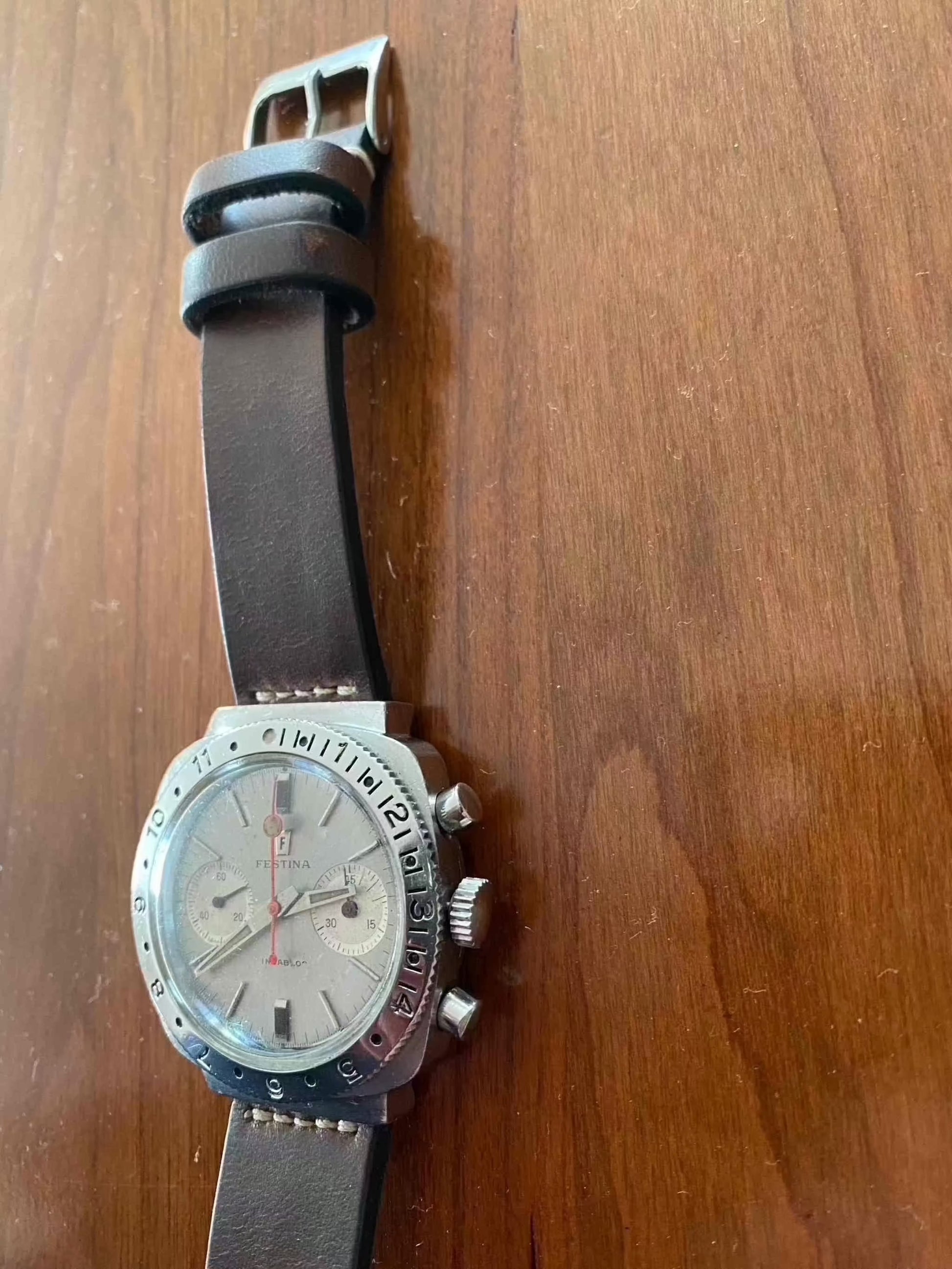 Vintage Festina Incabloc Chronograph Valjoux 7733 38mm watch with leather band and silver dial, serviced and in excellent condition.
