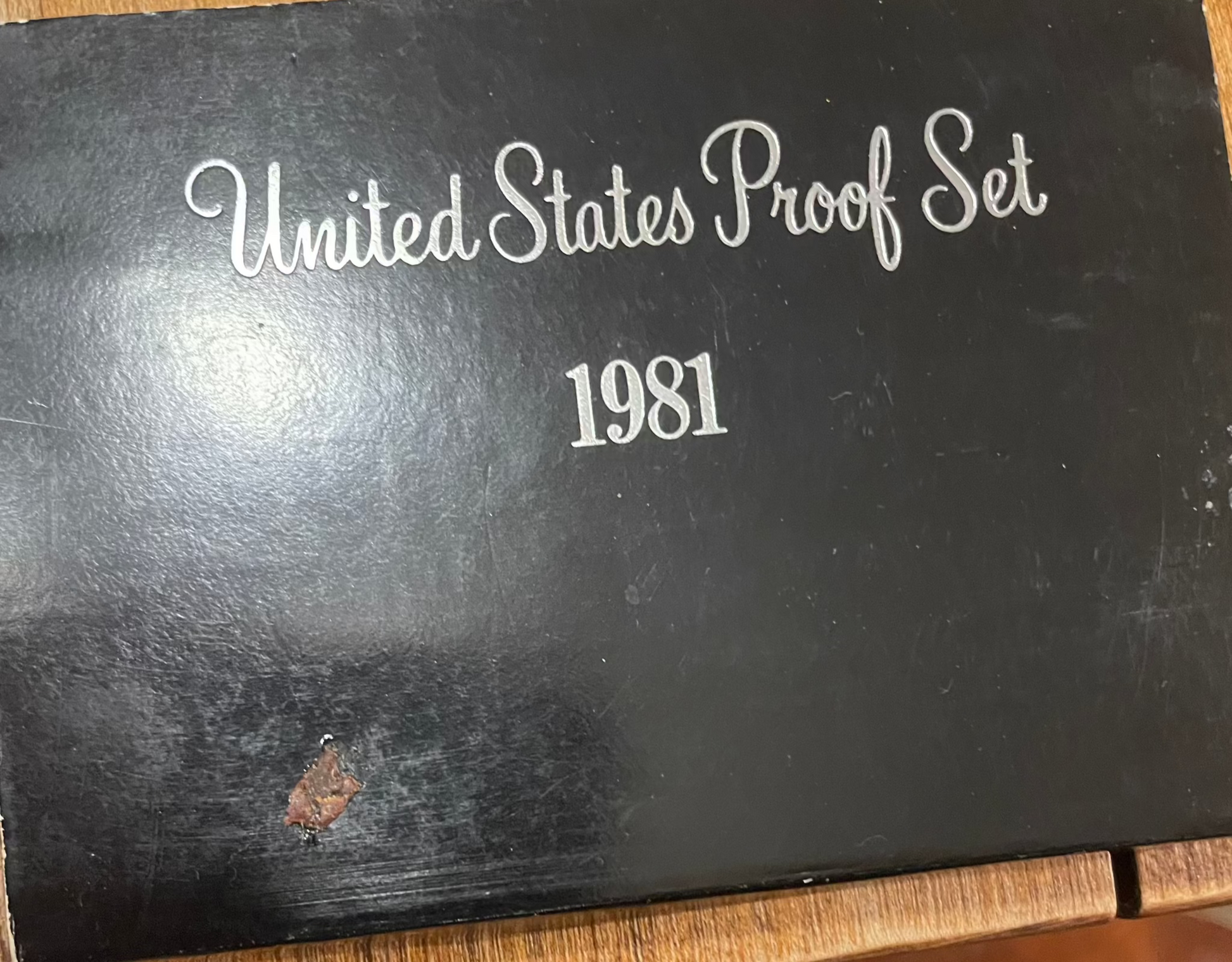Collector's lot of four penny books featuring years of Lincoln cents, Indian Head pennies, and near-mint 1943 steel cents bonus.