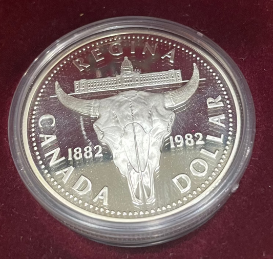 1982 Canada Silver Dollar Regina Centennial coin featuring elegant design.