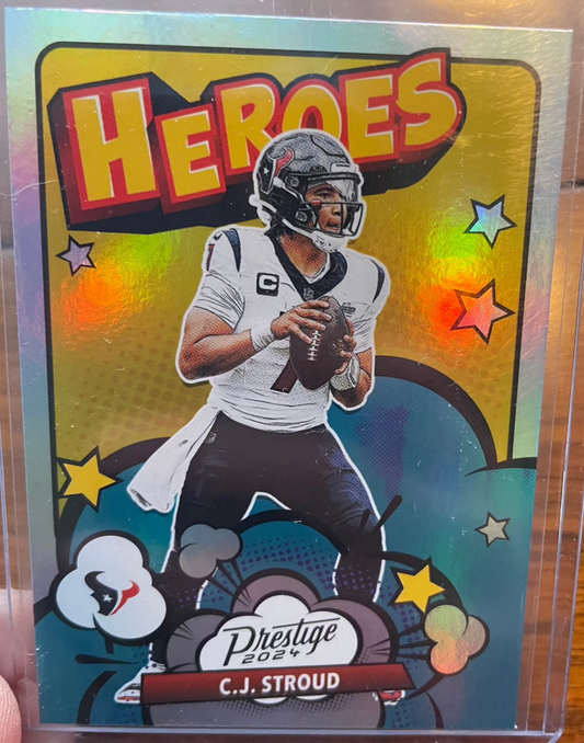 Stroud 2024 Panini Prestige Heroes 2 Houston Texans card featuring vibrant design.