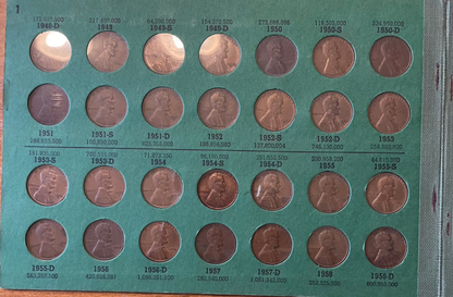 Collector's lot featuring Lincoln penny book with assorted historical coins, including Indian head pennies and near-mint 1943 steel cents.