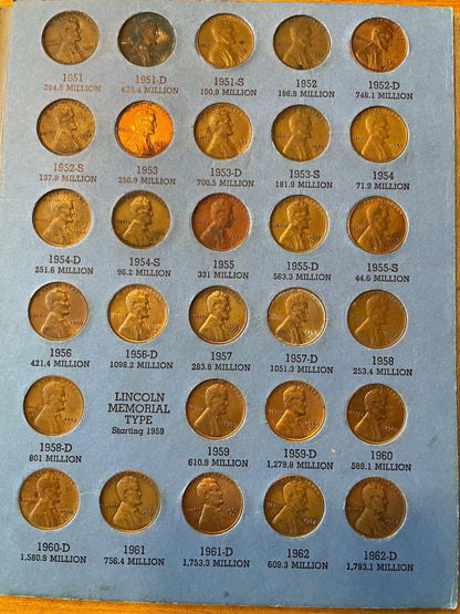 Collector's lot of four penny books with Lincoln cents, featuring Indian Head and near-mint 1943 steel cents bonus.